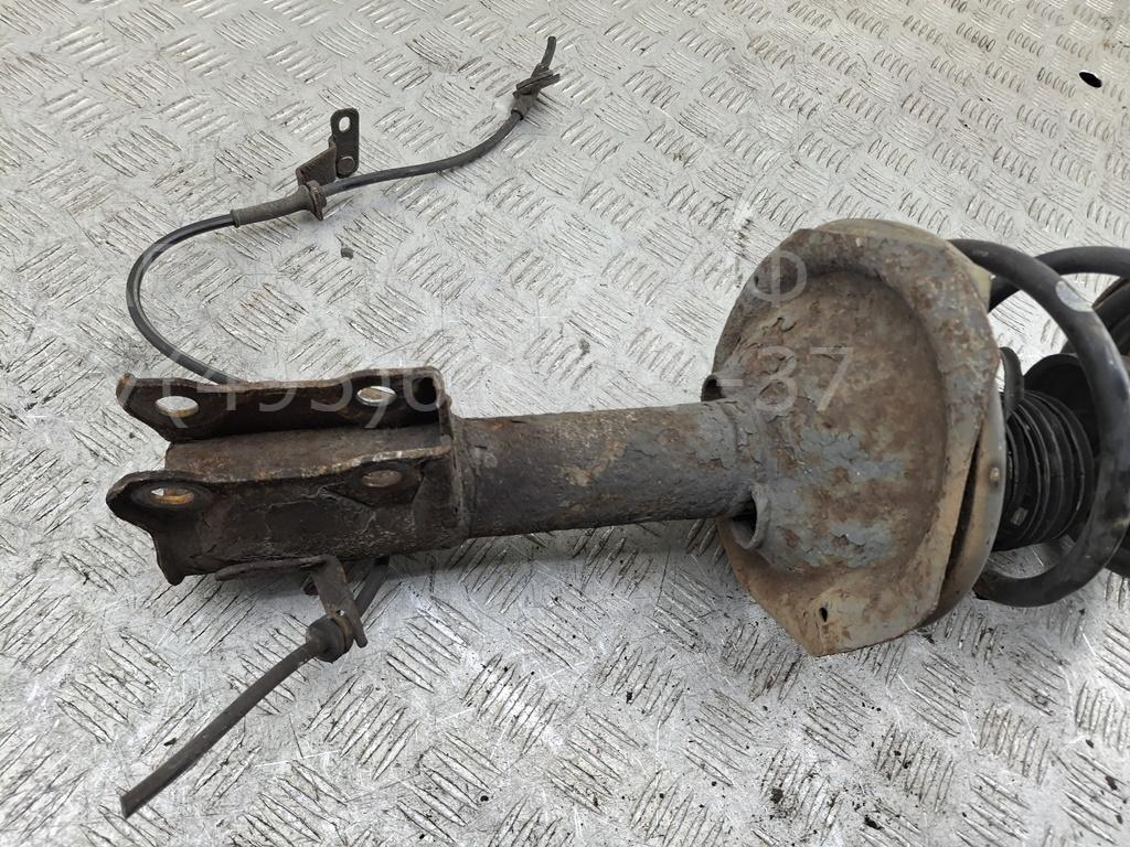 Амортизатор передний левый