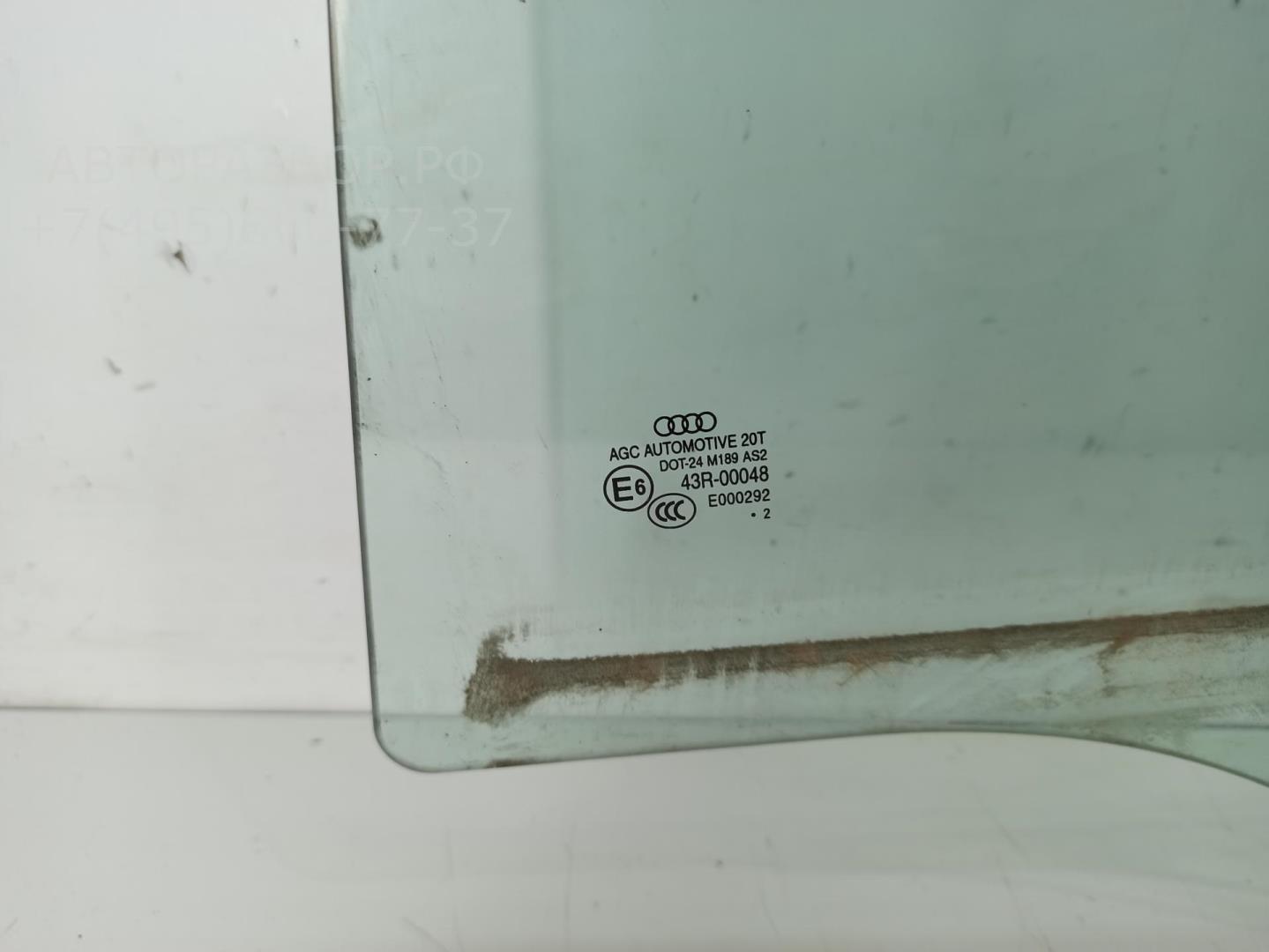 Стекло двери задней левой