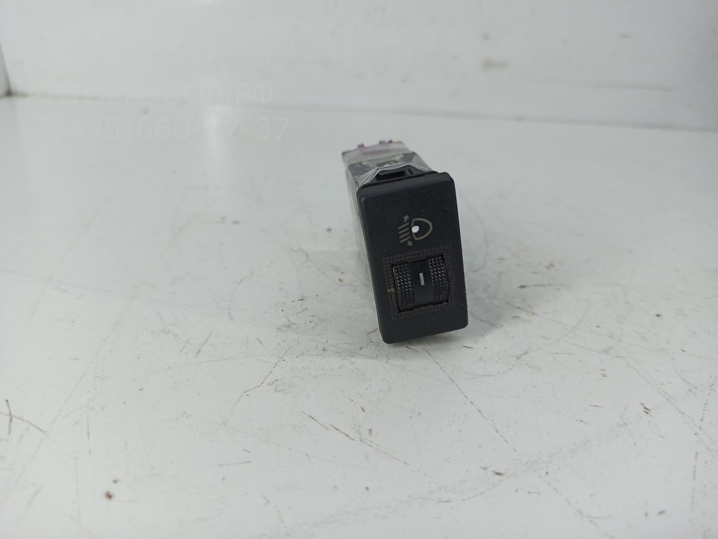 Кнопка корректора фар