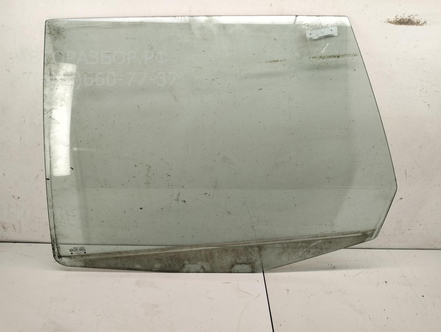 Стекло двери задней левой
