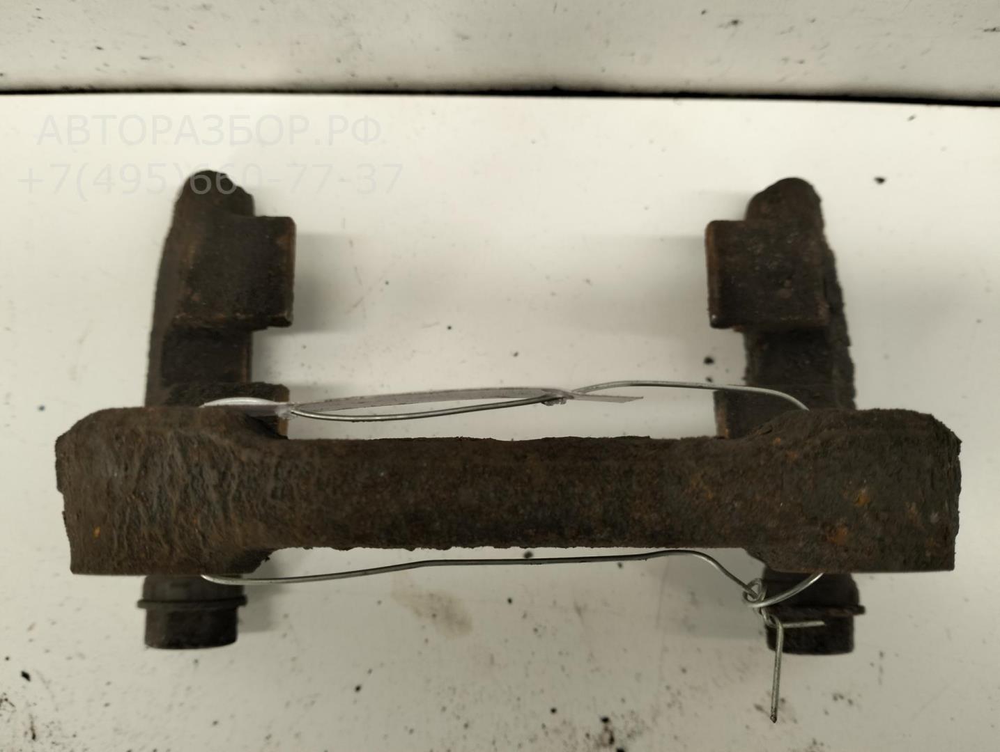 Скоба суппорта заднего