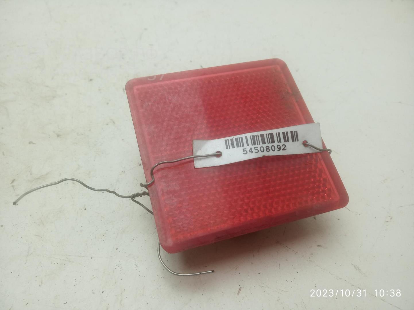 Отражатель в бампер задний левый