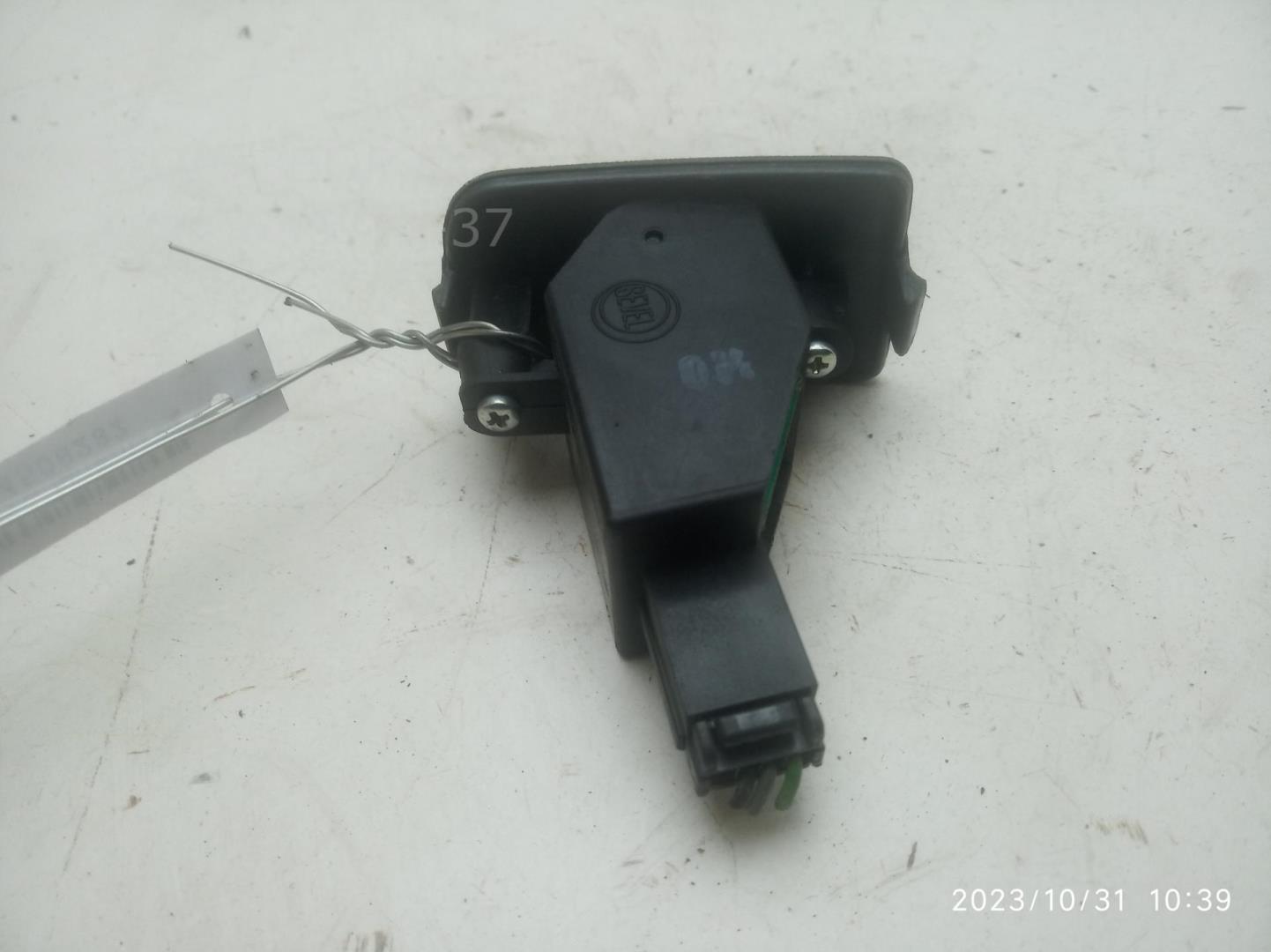 Кнопка корректора фар