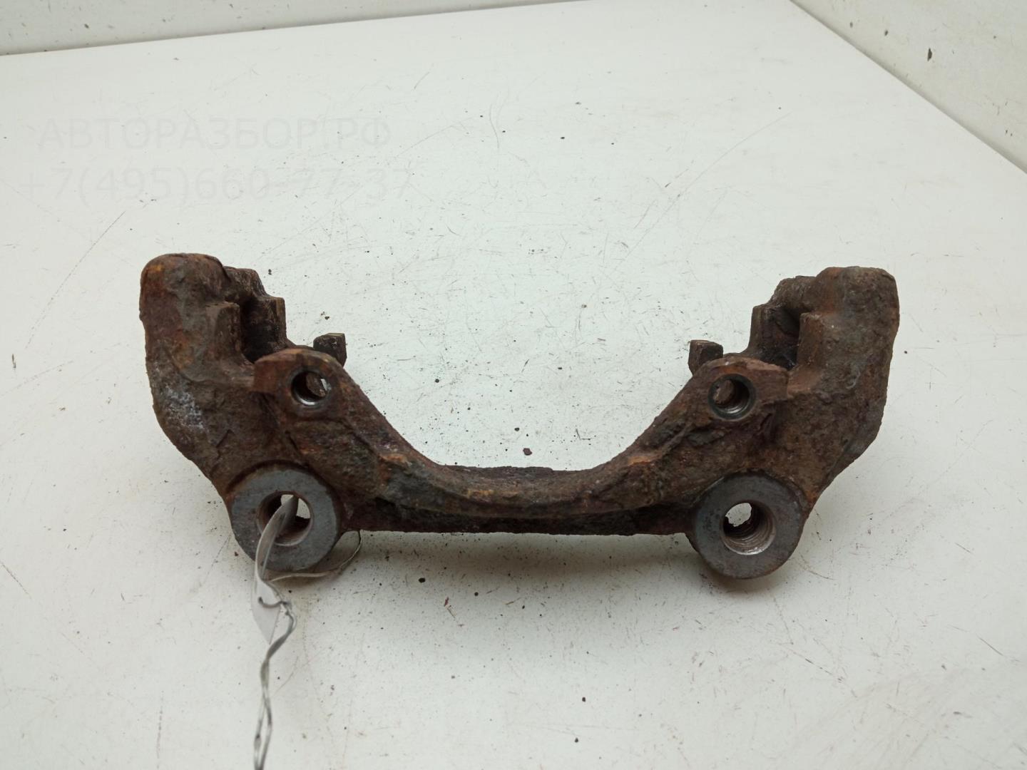 Скоба суппорта переднего
