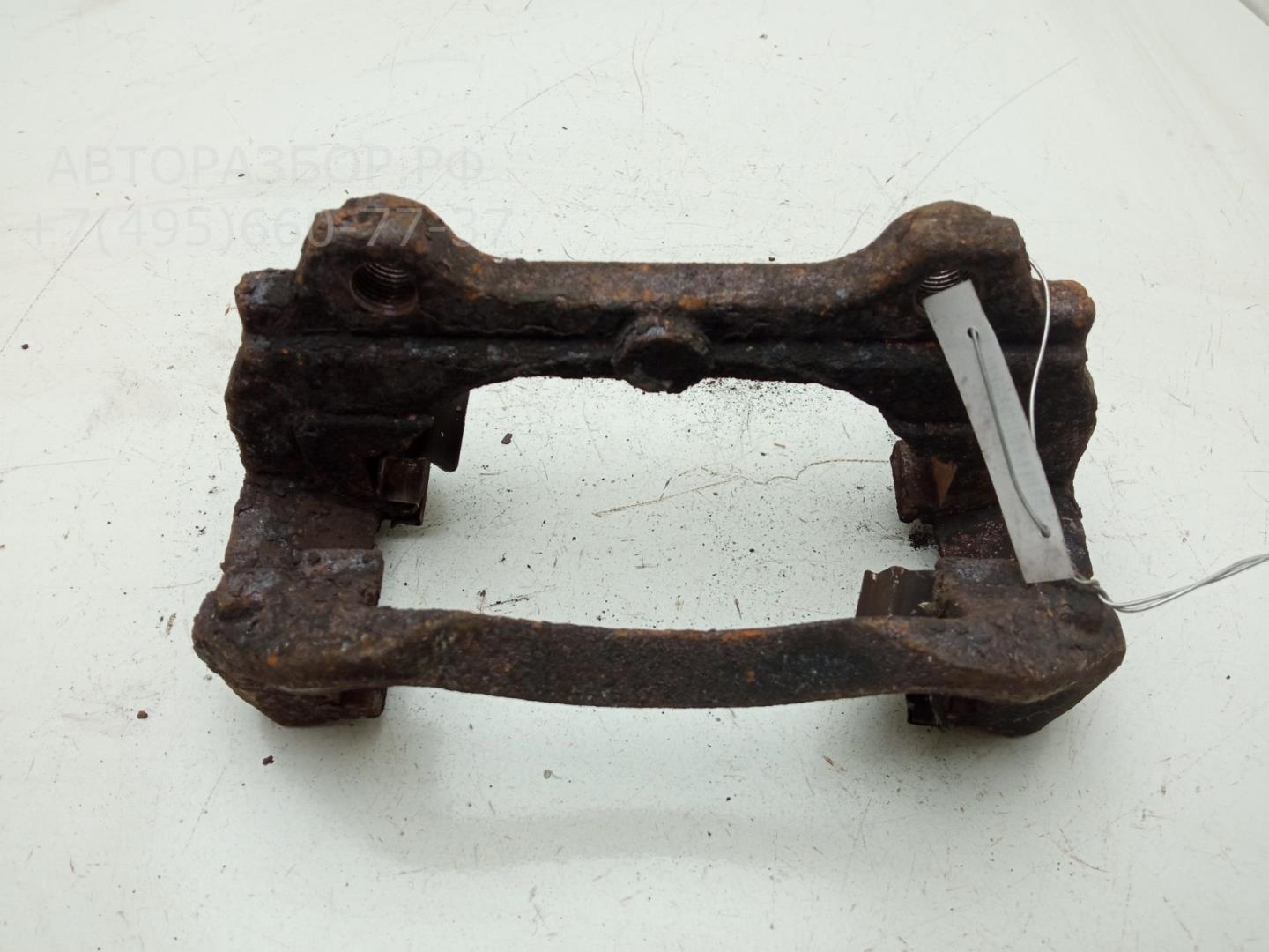 Скоба суппорта переднего