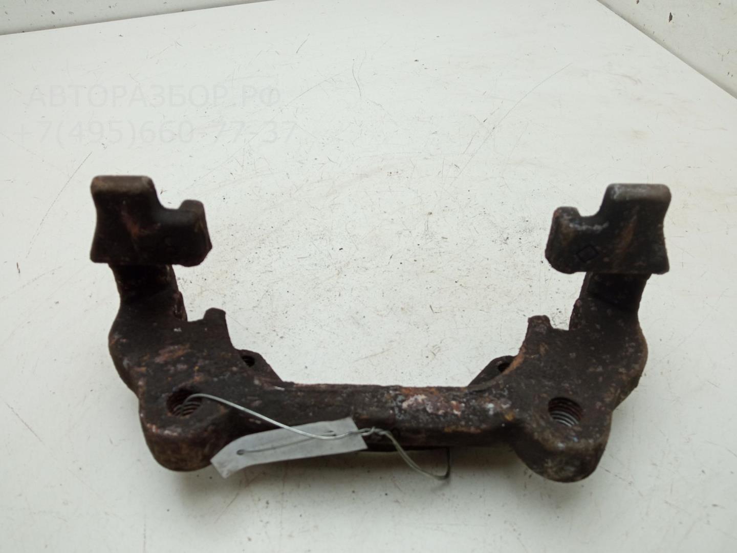 Скоба суппорта переднего