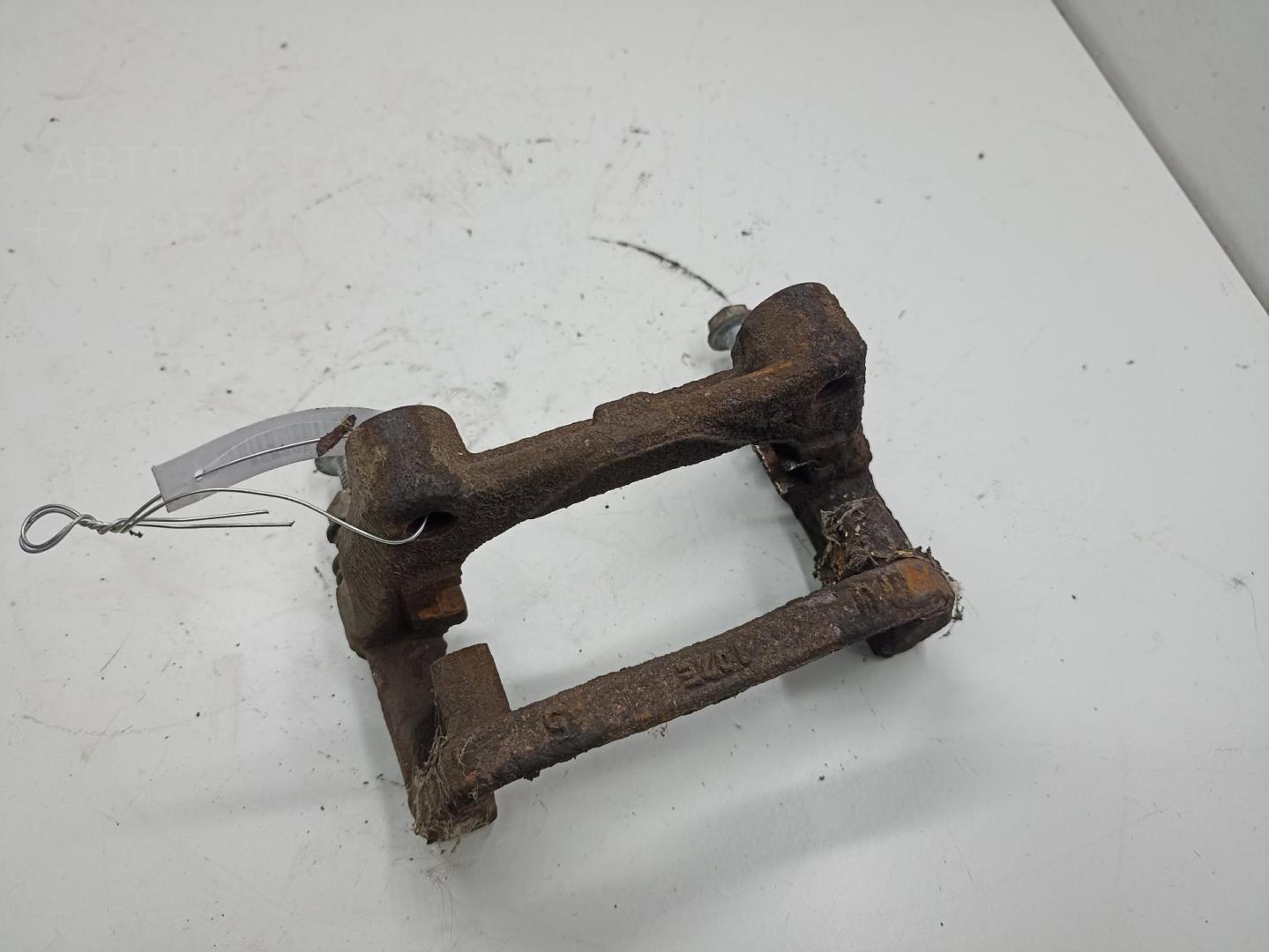 Скоба суппорта заднего