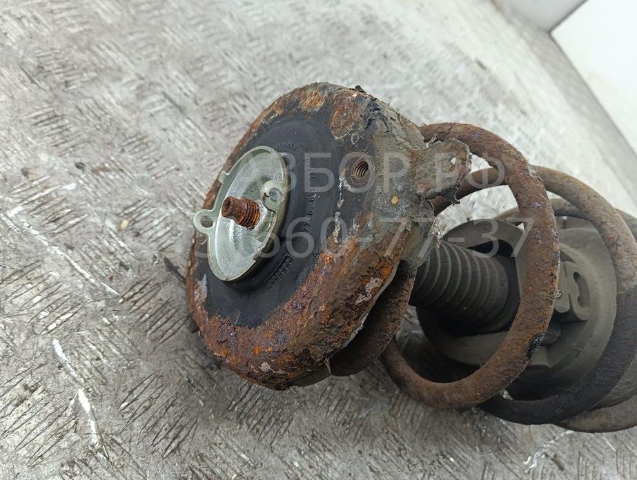 Амортизатор передний левый