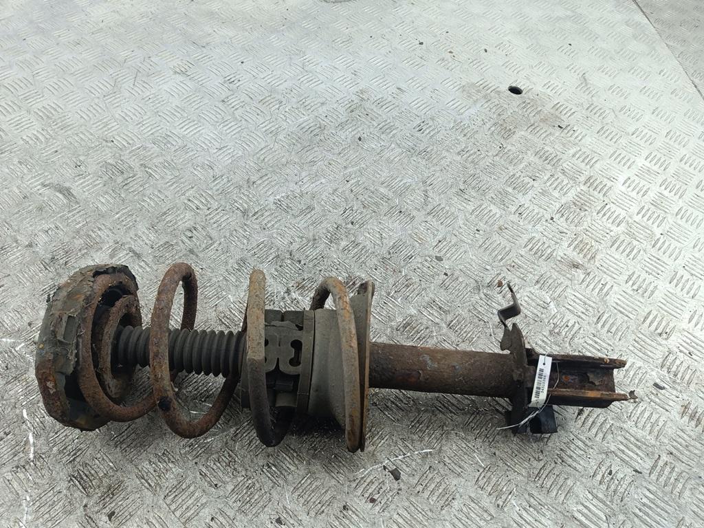 Амортизатор передний левый