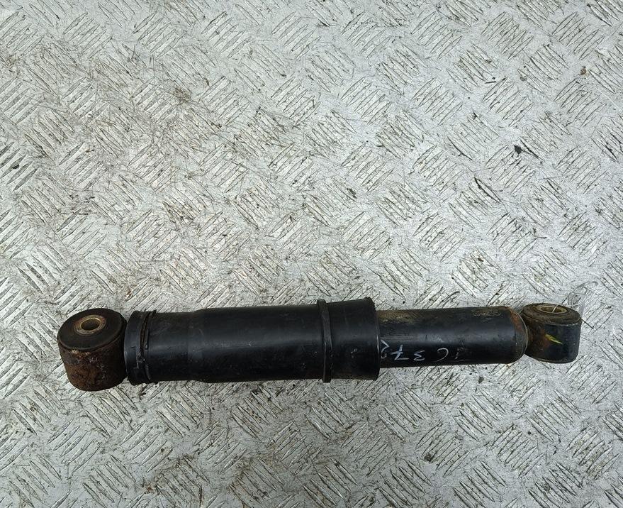 Амортизатор задний левый