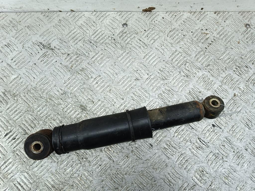 Амортизатор задний левый