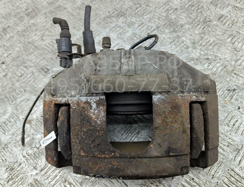 Суппорт передний левый