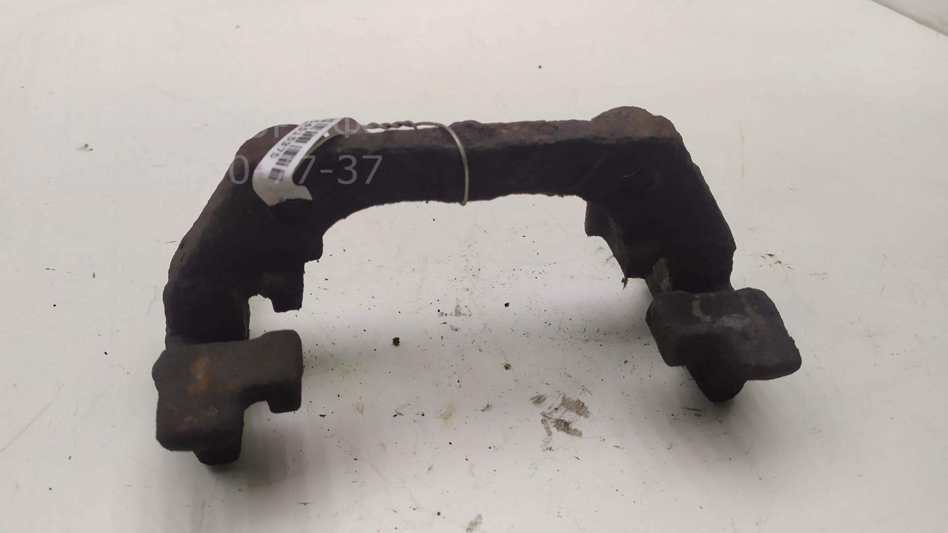 Скоба суппорта заднего