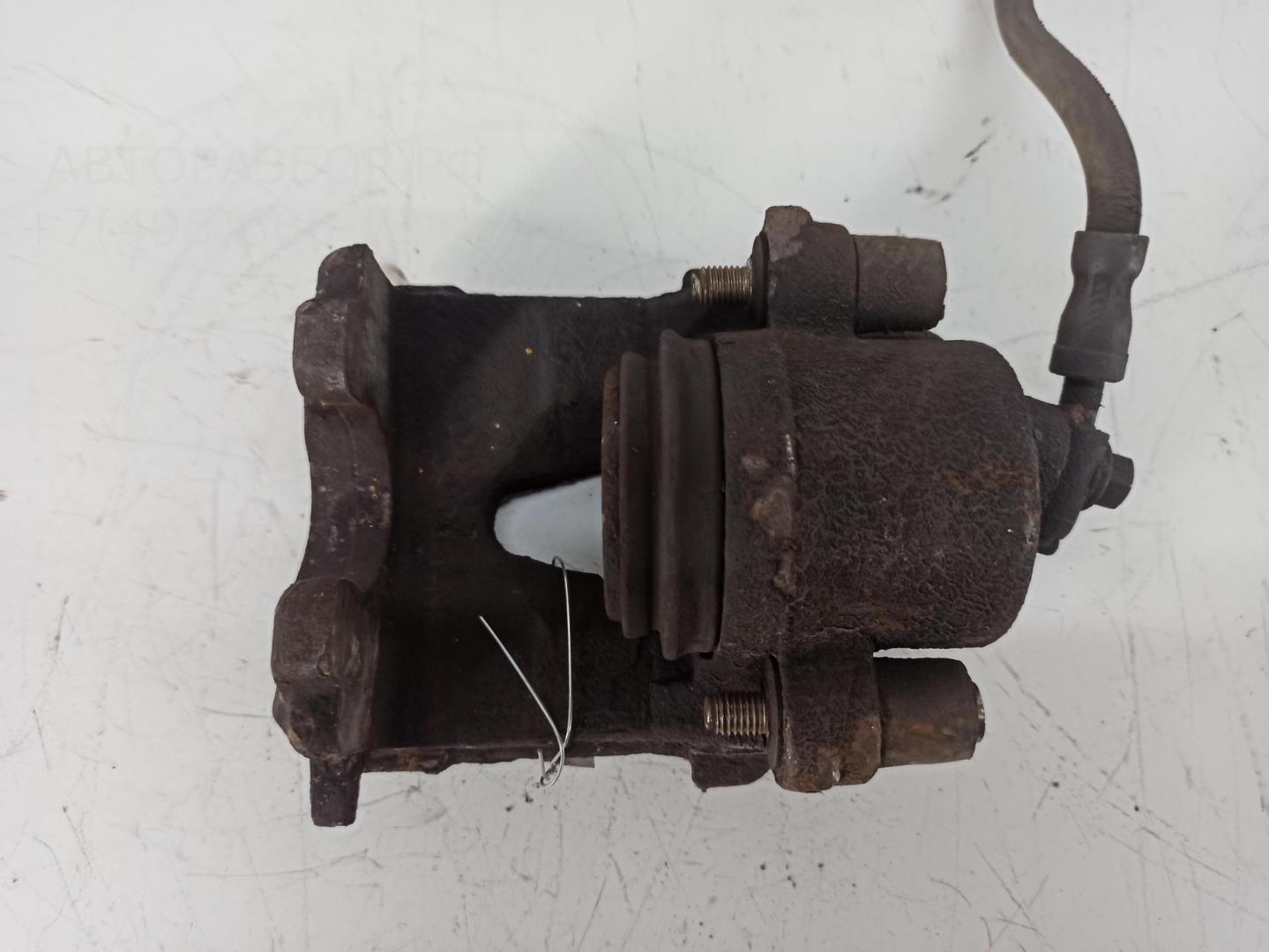 Суппорт передний левый