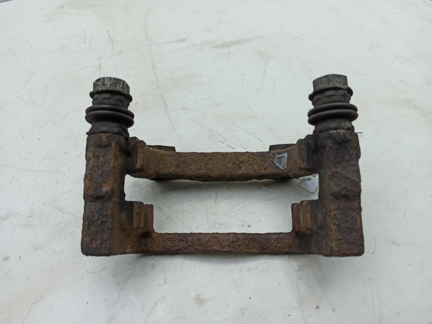 Скоба суппорта заднего