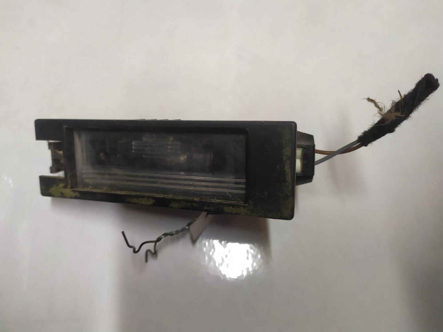 Фонарь подсветки номера