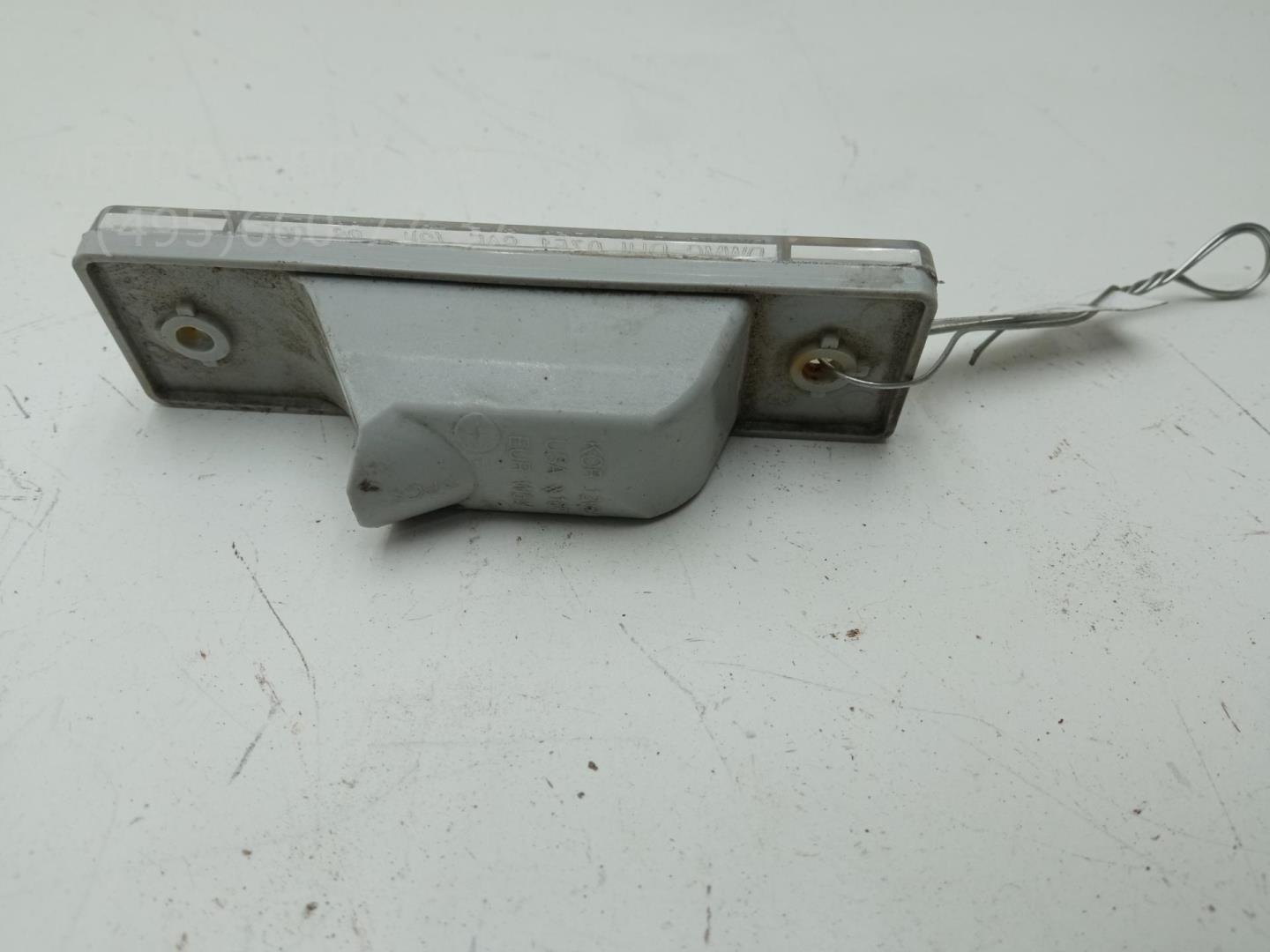 Фонарь подсветки номера