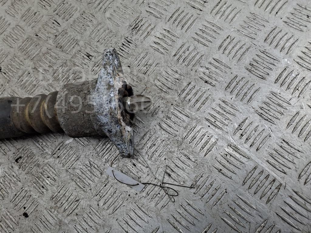 Амортизатор задний левый