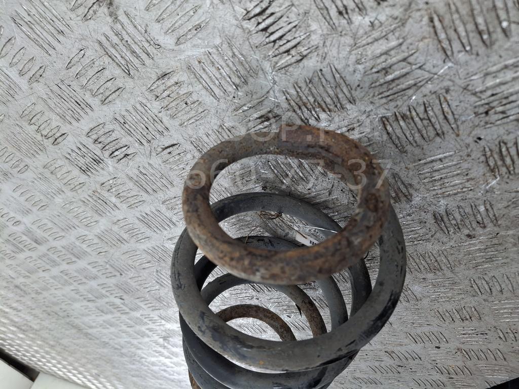 Пружина задняя