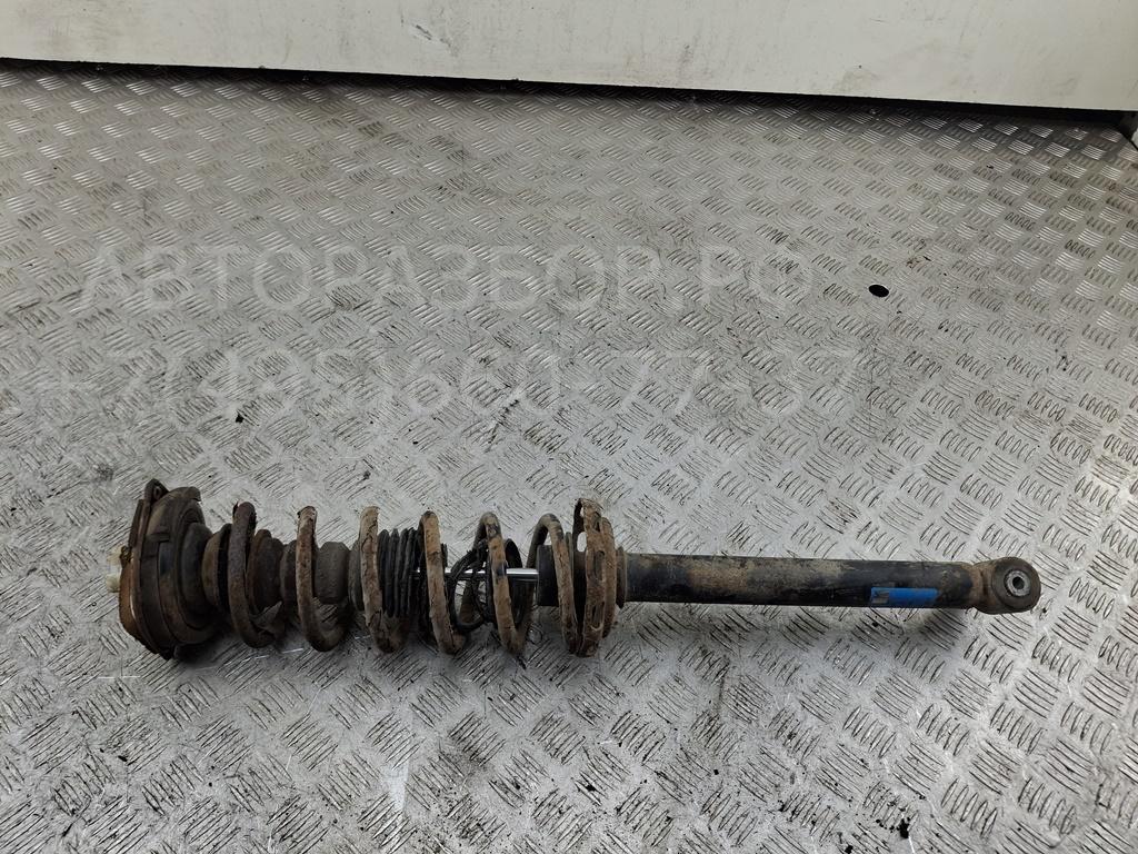 Амортизатор задний левый