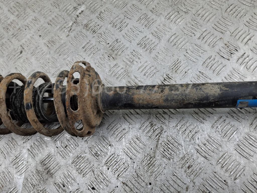 Амортизатор задний левый