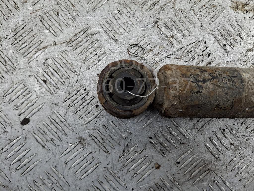 Амортизатор задний левый