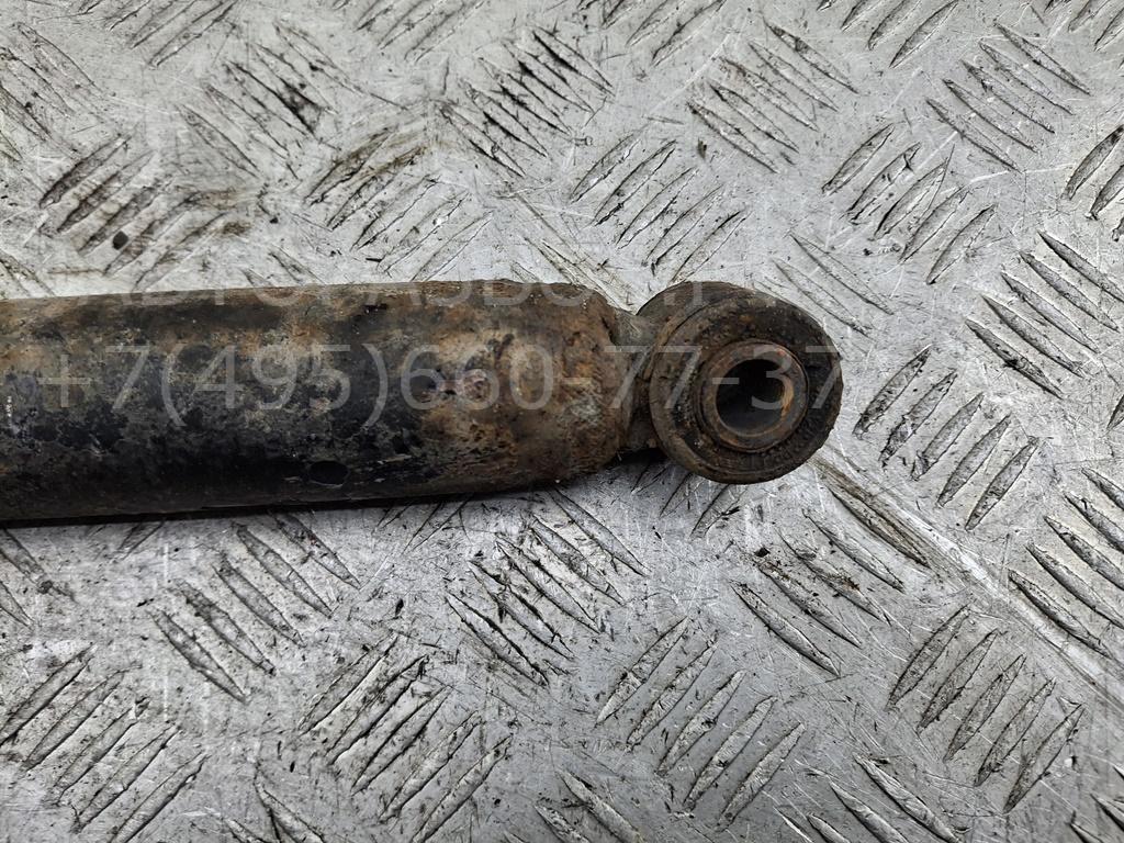 Амортизатор задний левый