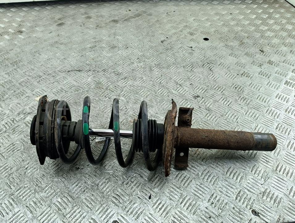 Амортизатор передний левый