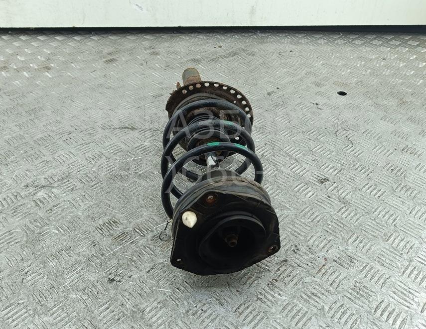 Амортизатор передний левый