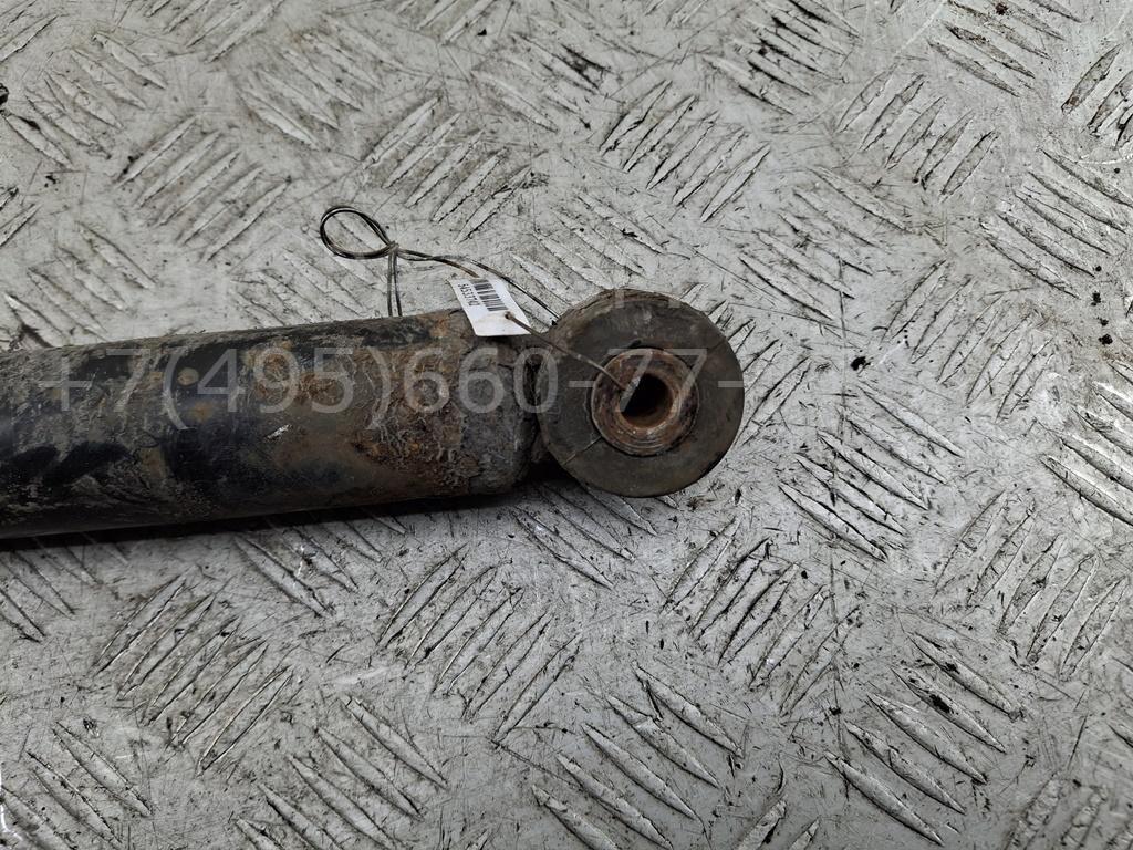 Амортизатор задний левый