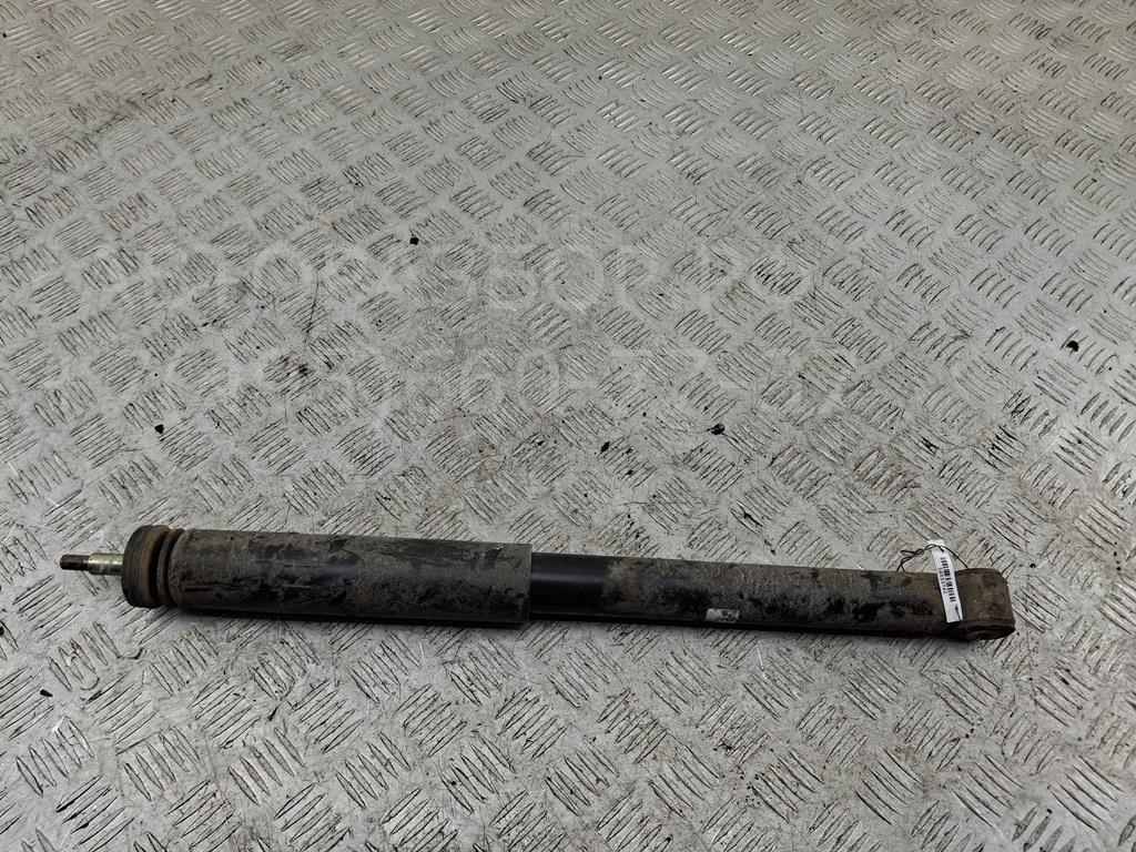 Амортизатор задний левый