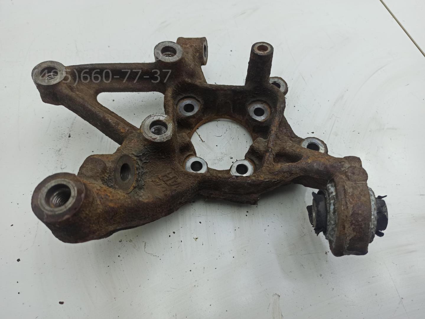 Кулак поворотный задний правый