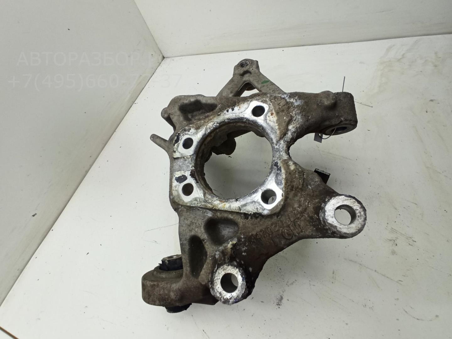 Кулак поворотный задний левый