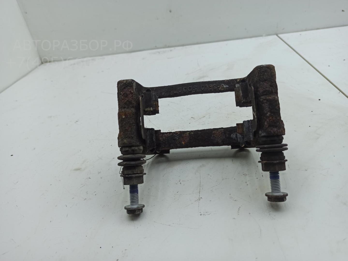 Скоба суппорта заднего