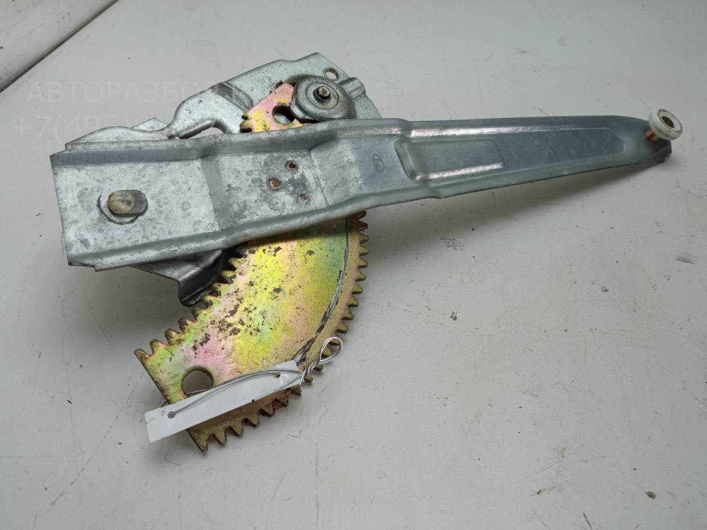 Стеклоподъемник механ. задний левый