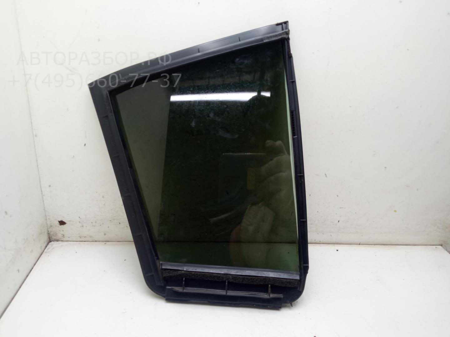 Стекло двери задней левой (форточка)