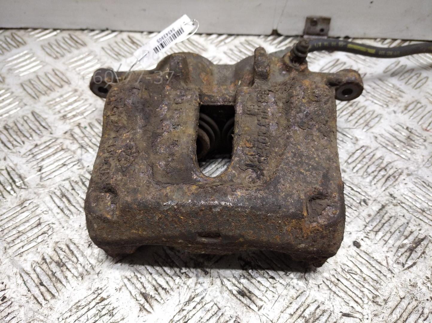 Суппорт передний левый