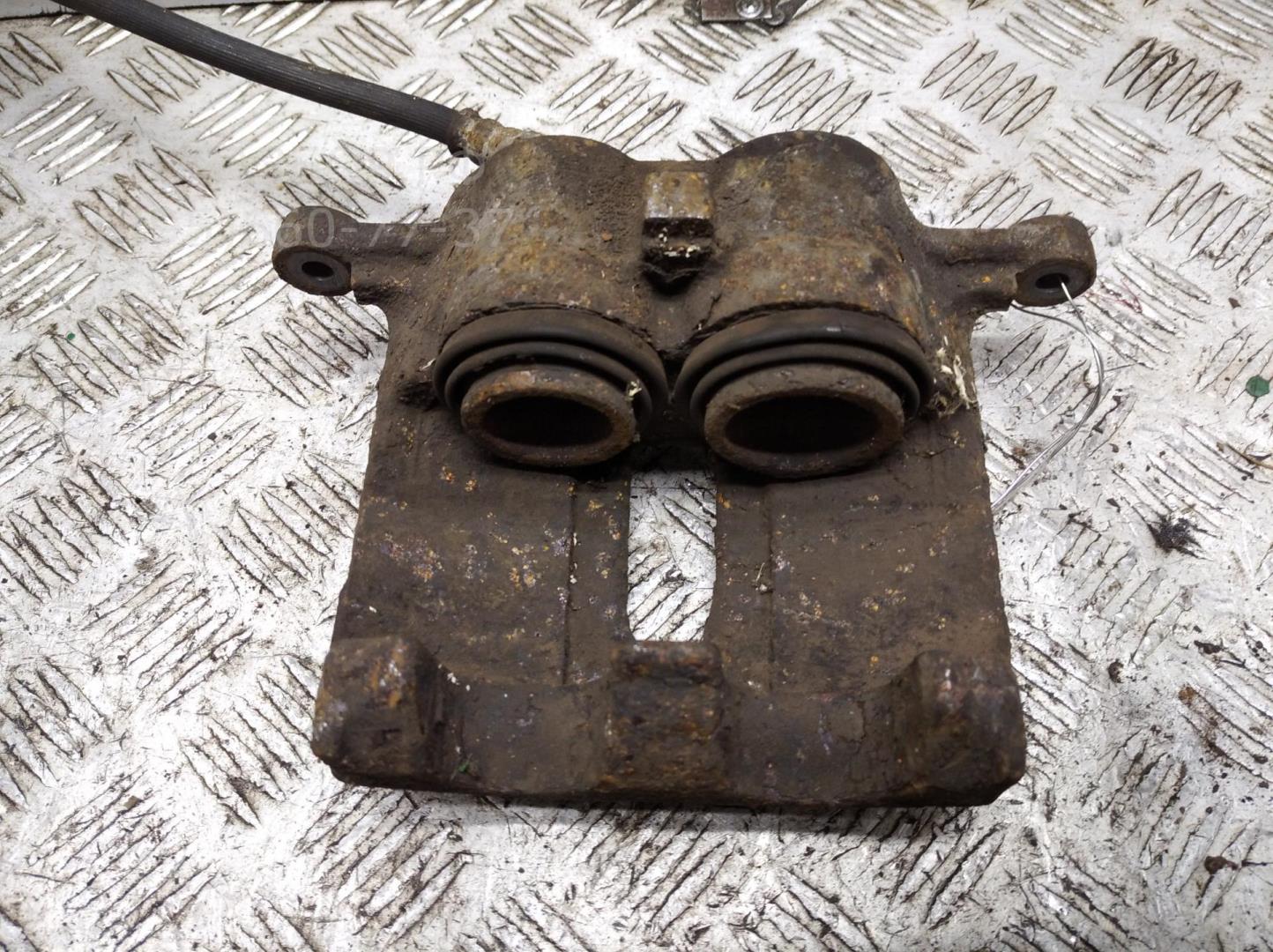 Суппорт передний левый