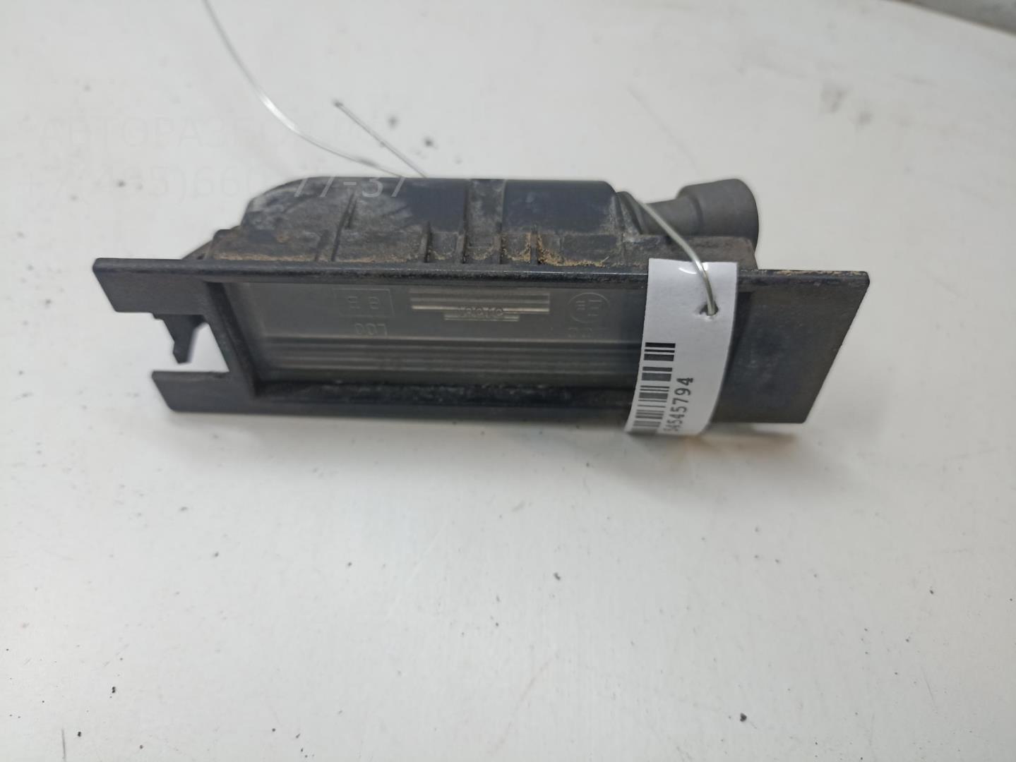 Фонарь подсветки номера