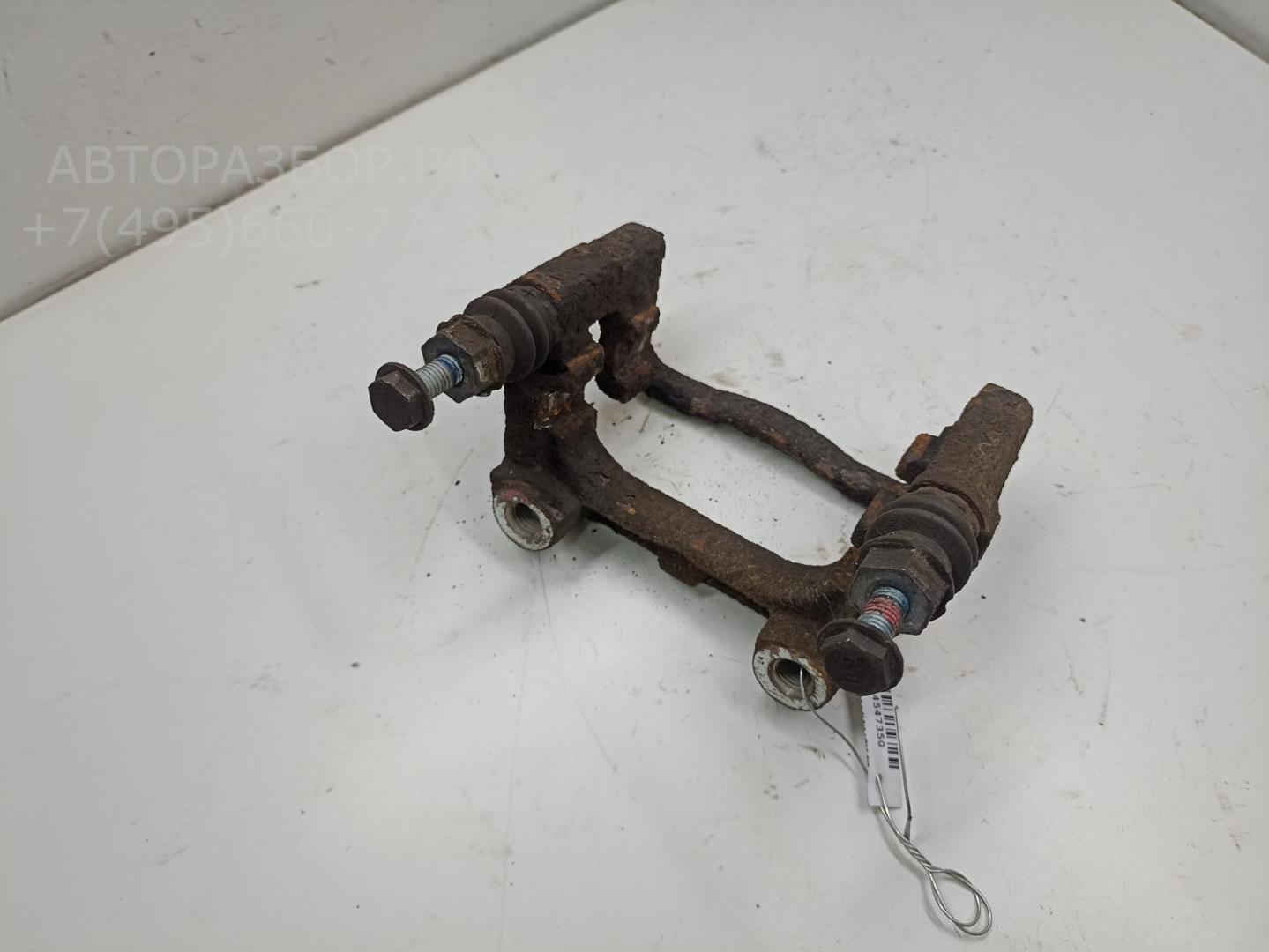 Скоба суппорта заднего