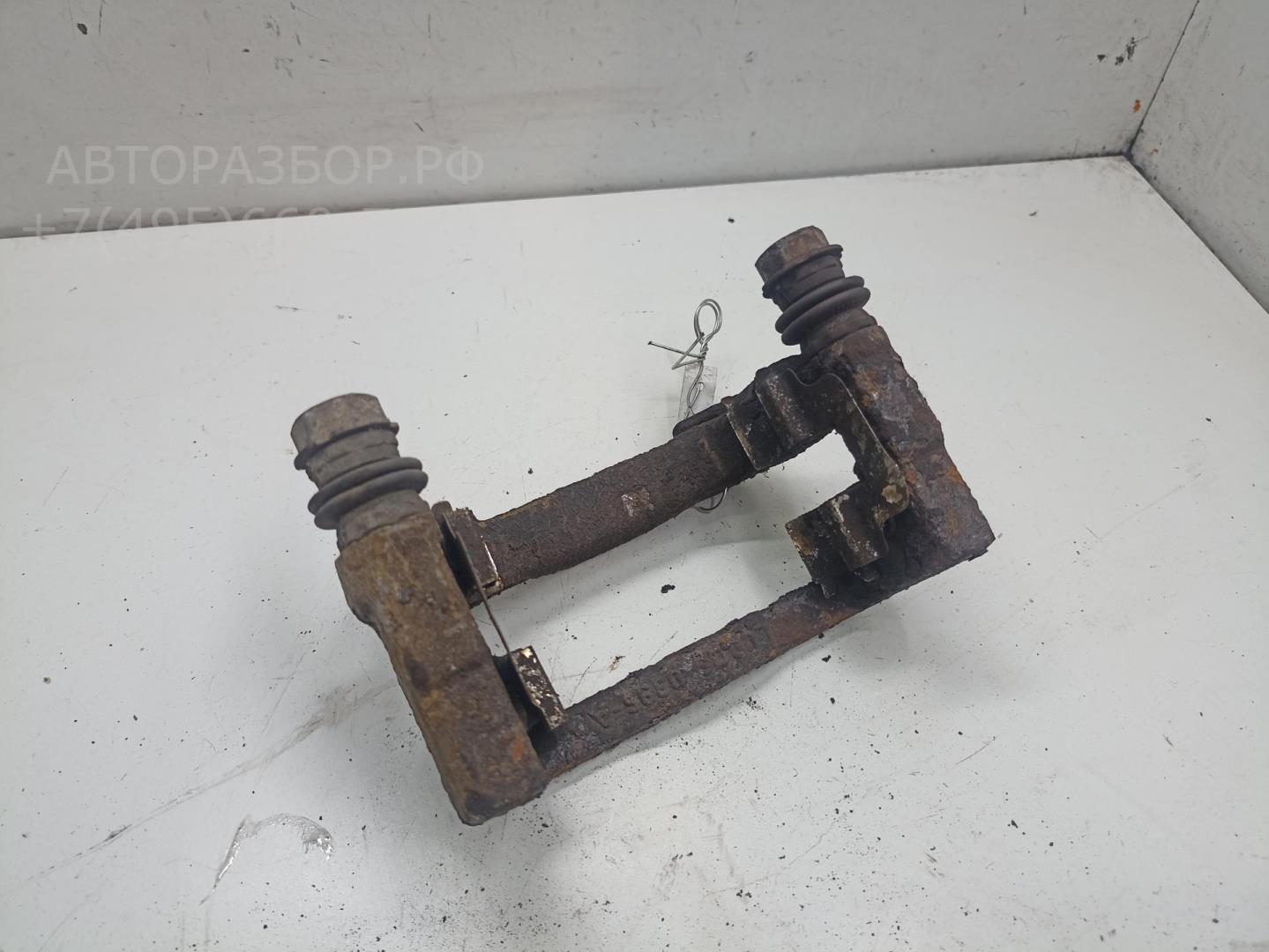 Скоба суппорта заднего