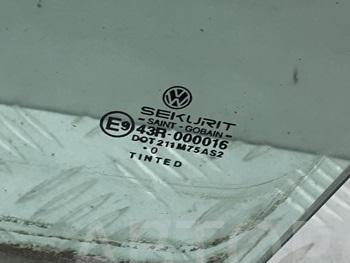 Стекло двери передней левой