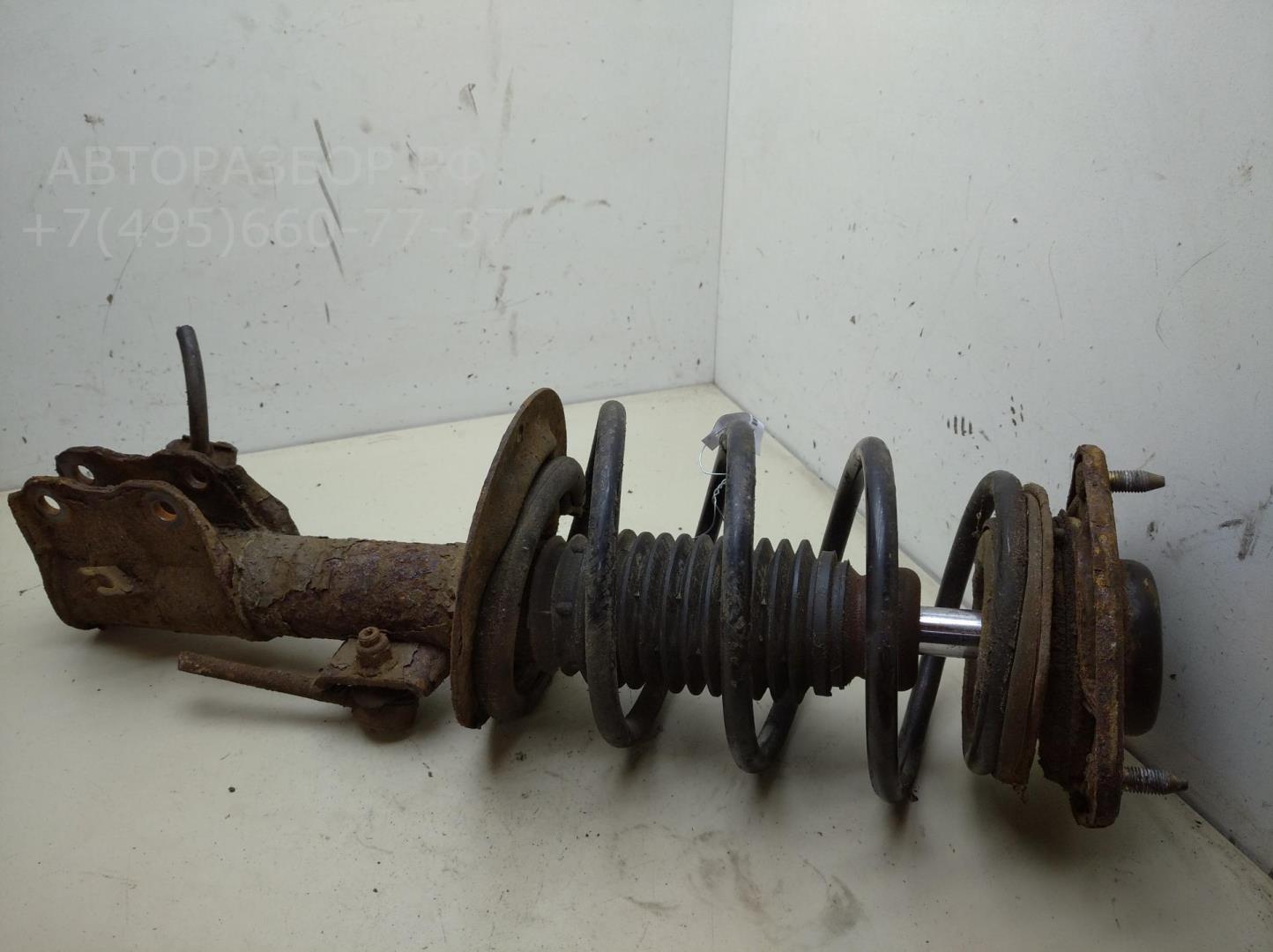 Амортизатор передний левый