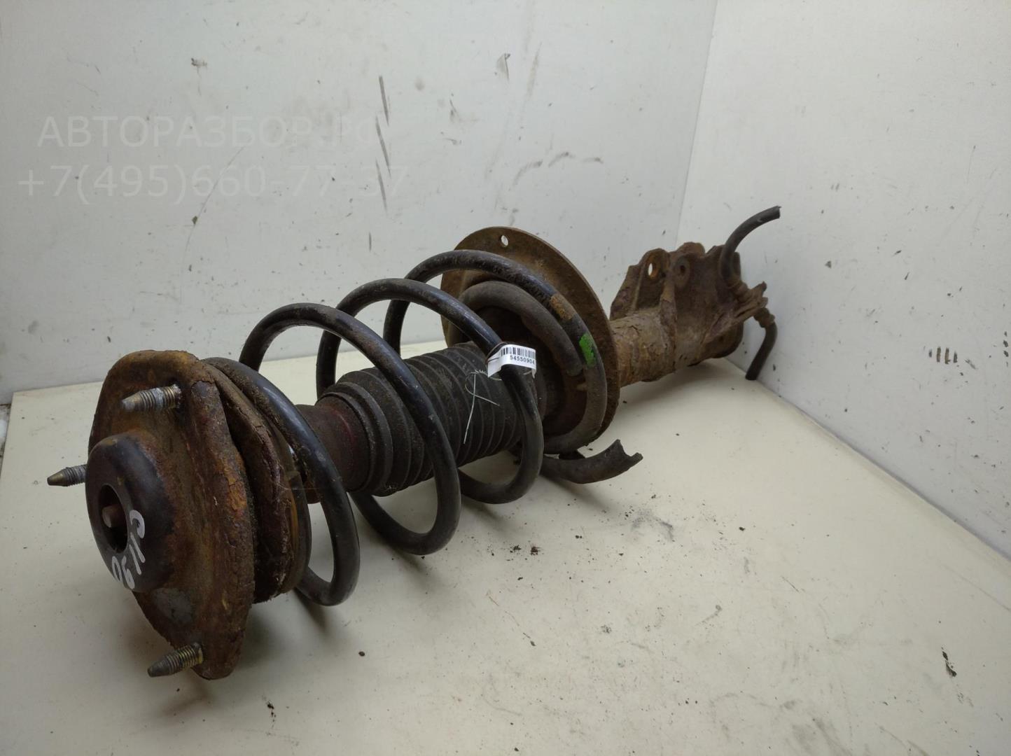 Амортизатор передний левый