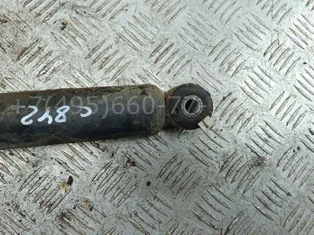 Амортизатор задний левый