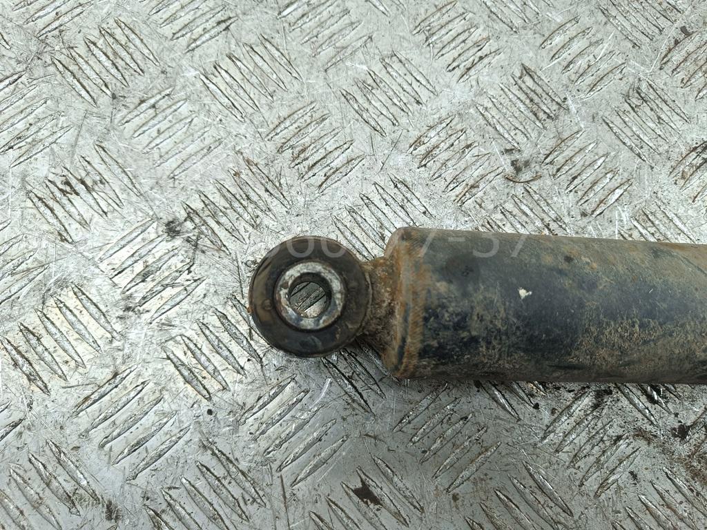 Амортизатор задний левый