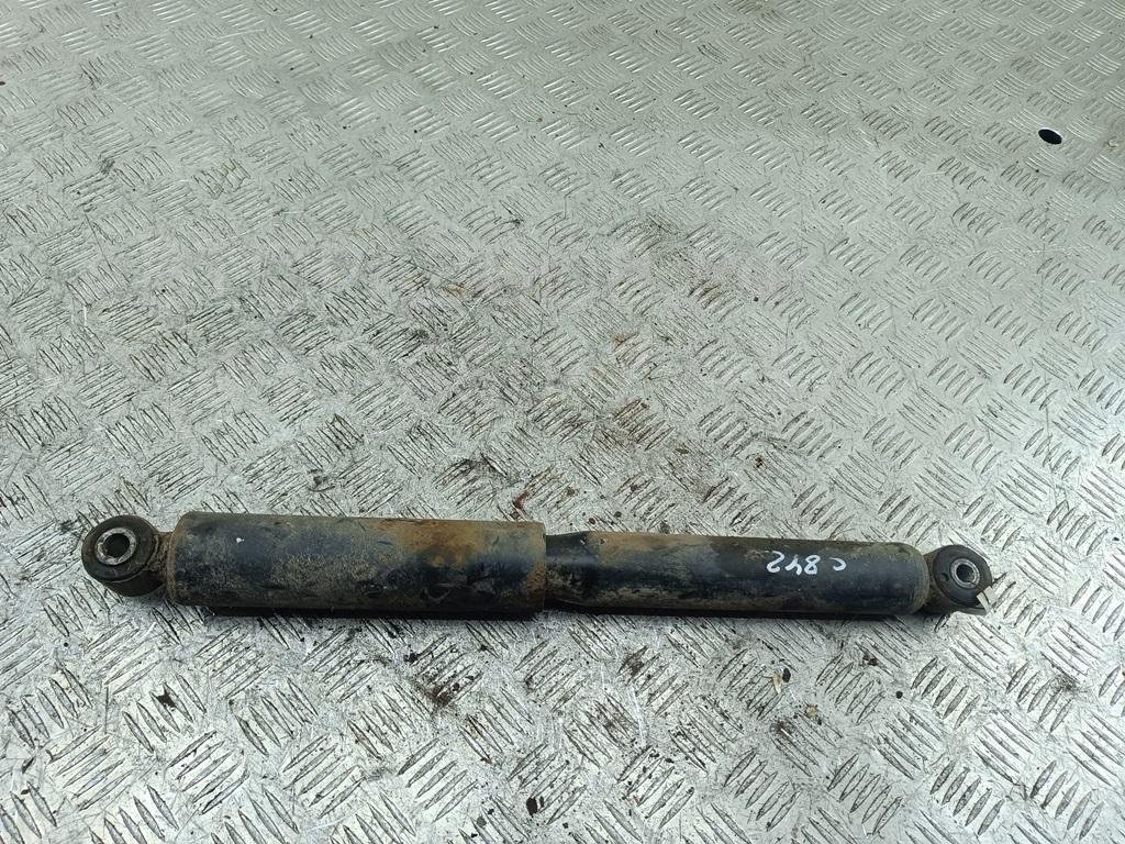 Амортизатор задний левый