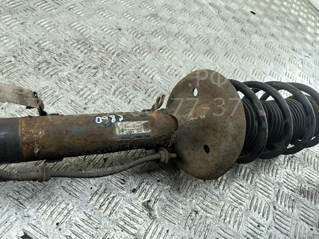 Амортизатор передний левый