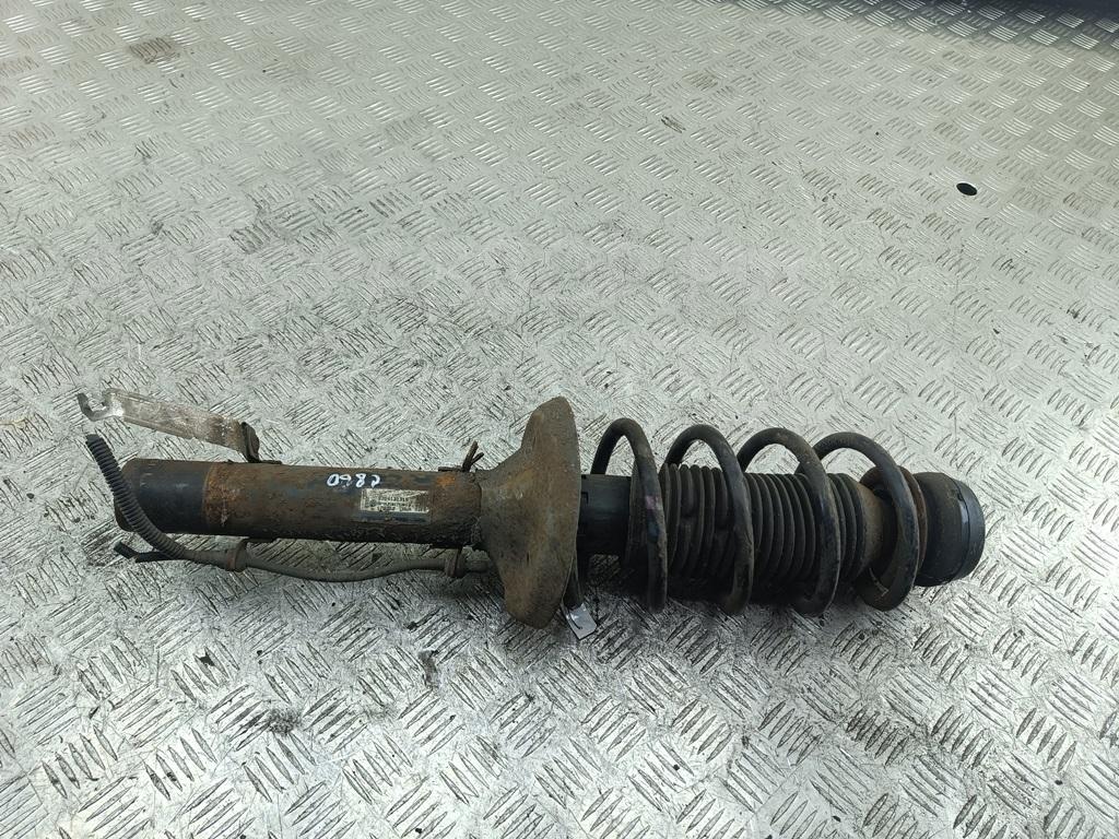 Амортизатор передний левый