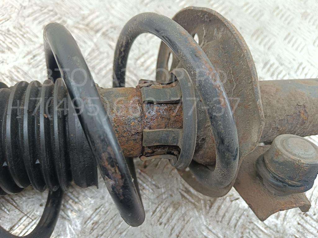 Амортизатор передний левый